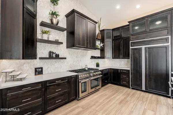 a bathroom with a shower and a bath tub