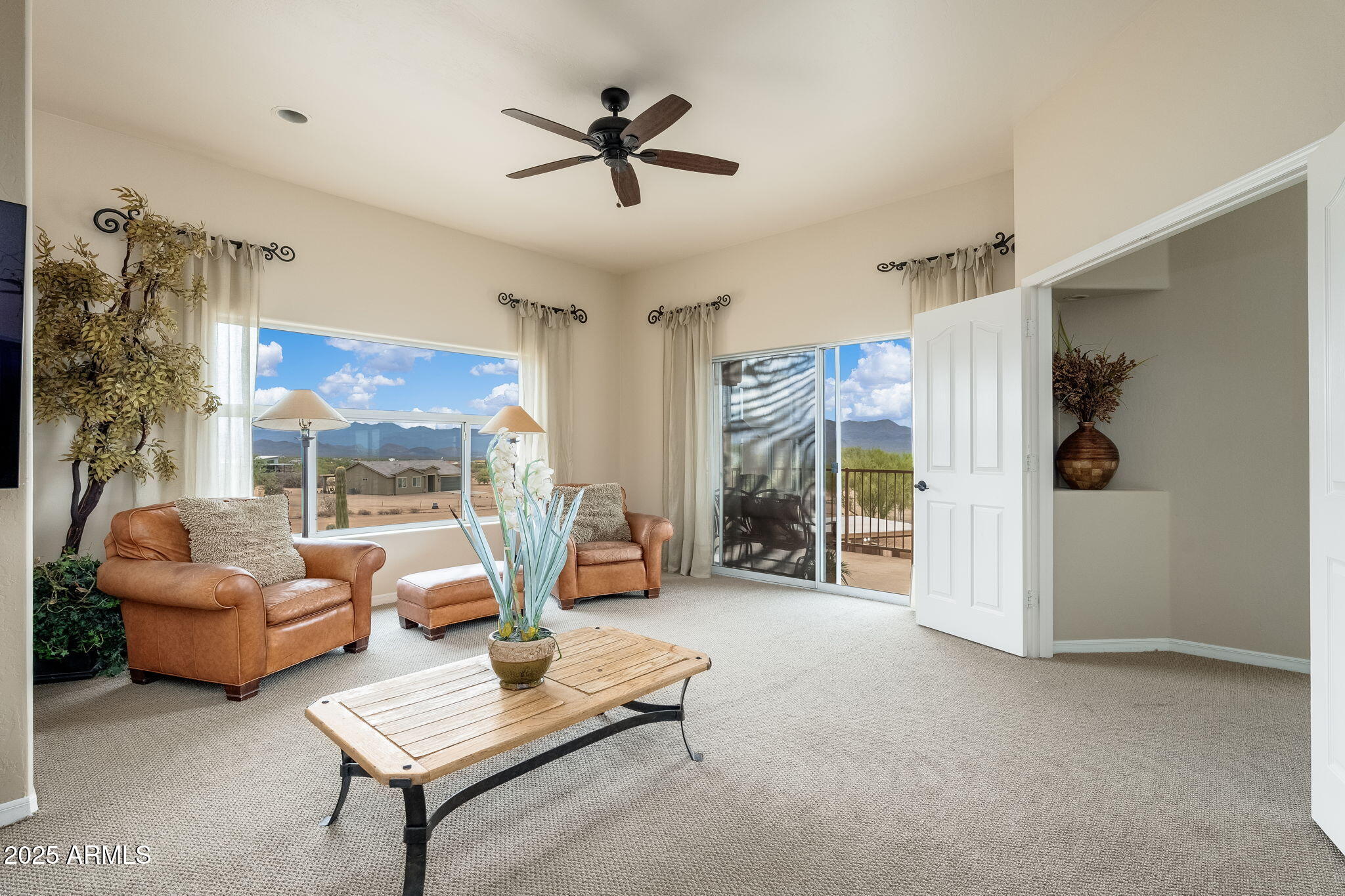 17047 East Dixileta Drive Rio Verde, AZ 85263 - Photo 44 of 115 a living room with furniture and a large window