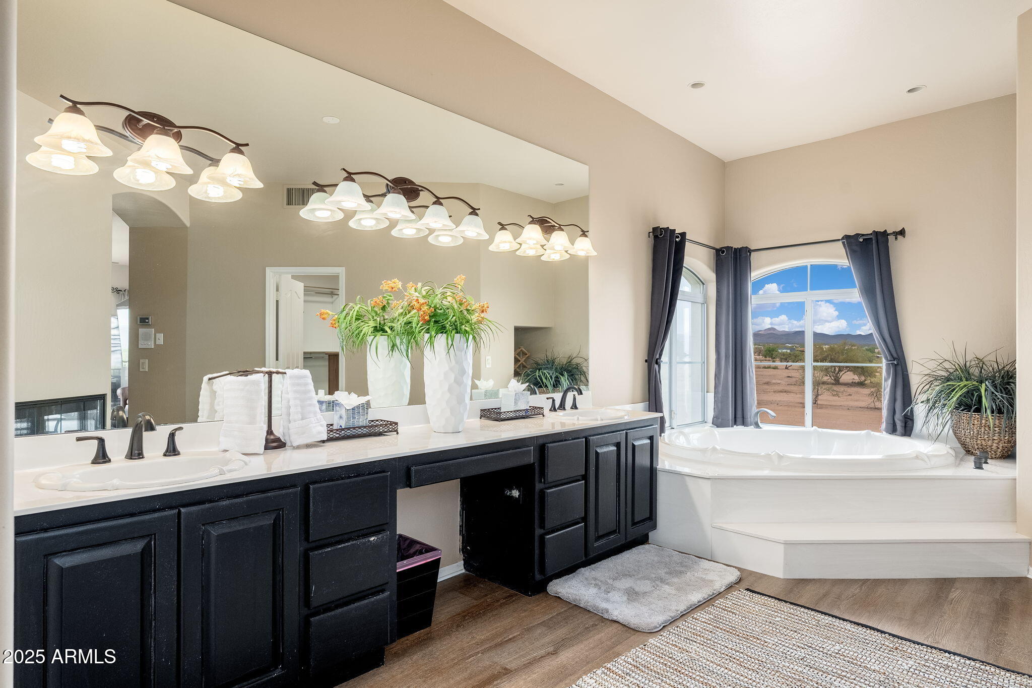 17047 East Dixileta Drive Rio Verde, AZ 85263 - Photo 49 of 115 a bathroom with a double vanity sink mirror and a bathtub