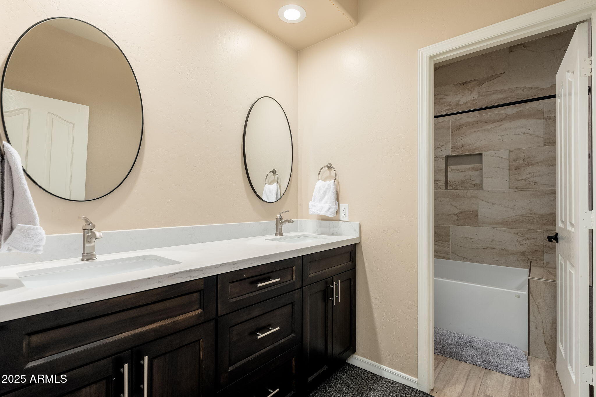 17047 East Dixileta Drive Rio Verde, AZ 85263 - Photo 59 of 115 a bathroom with a double vanity sink and a mirror