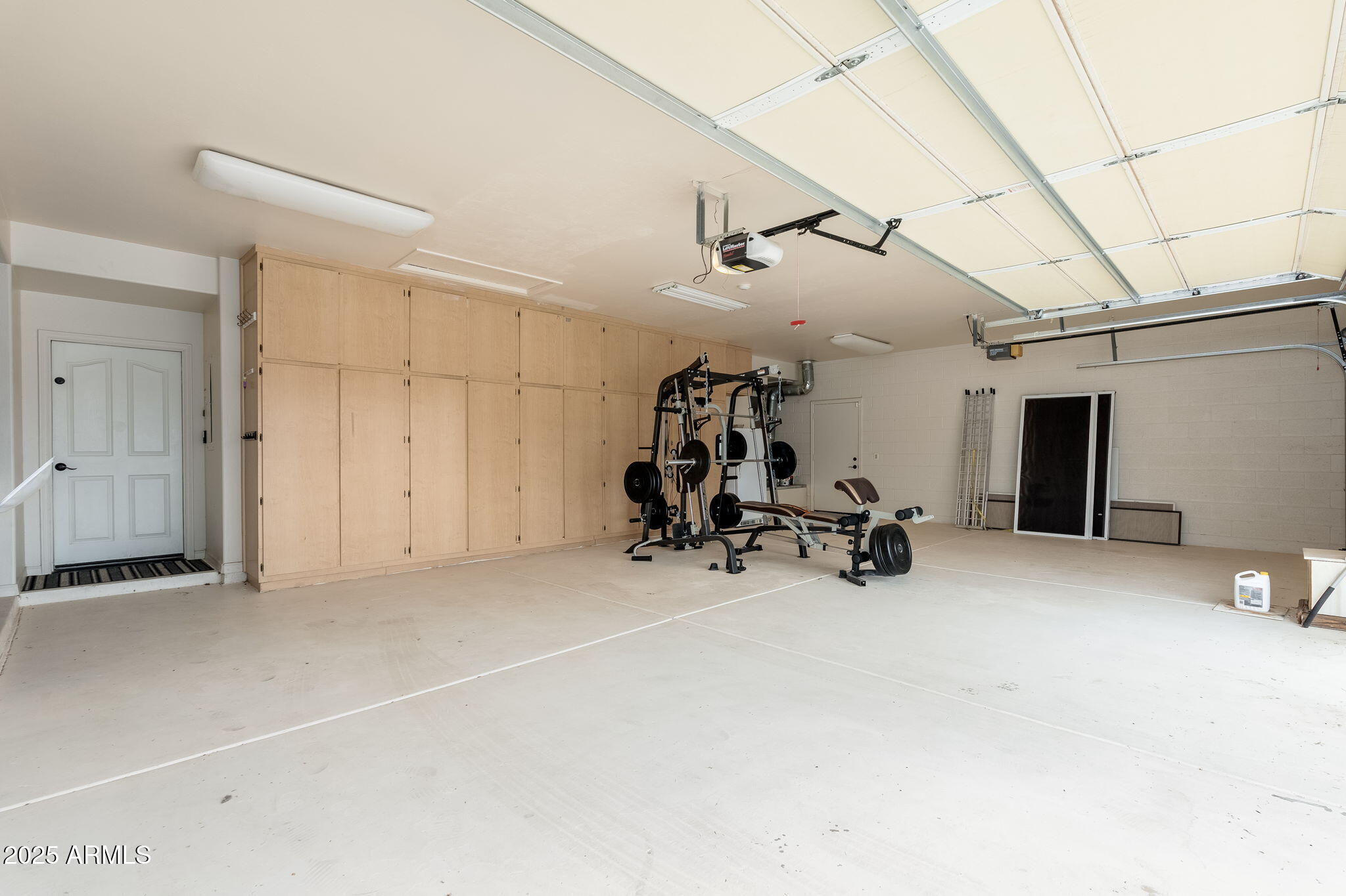 17047 East Dixileta Drive Rio Verde, AZ 85263 - Photo 63 of 115 a view of a garage with equipment