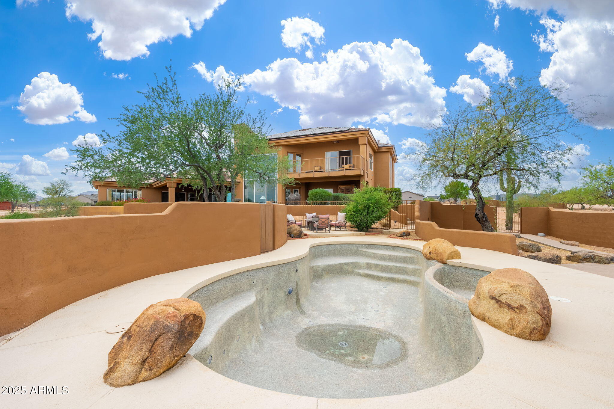 17047 East Dixileta Drive Rio Verde, AZ 85263 - Photo 73 of 115 a view of a house with swimming pool