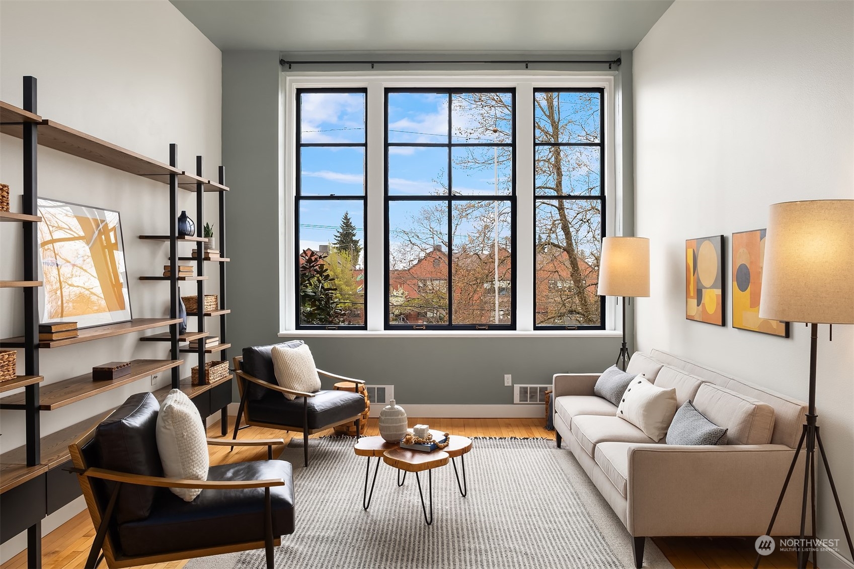 201 Galer Street, Unit 412 Seattle, WA 98109 - Photo 1 of 34 a living room with furniture and a large window