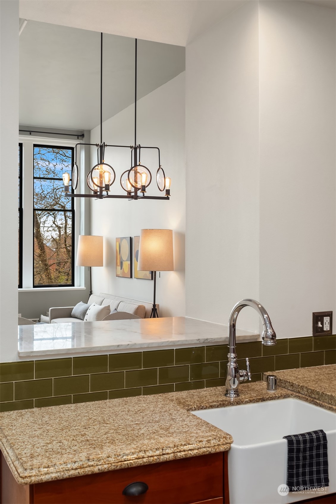 201 Galer Street, Unit 412 Seattle, WA 98109 - Photo 14 of 34 a bathroom with a granite countertop sink and a window
