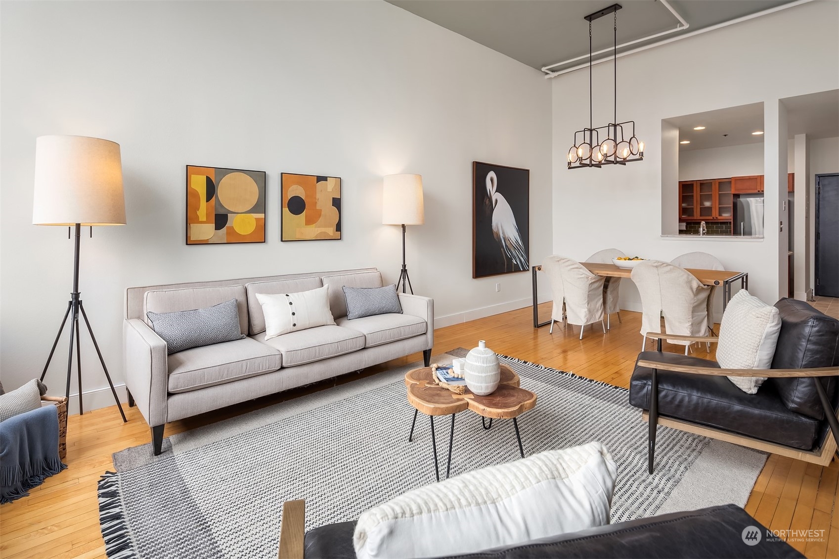 201 Galer Street, Unit 412 Seattle, WA 98109 - Photo 22 of 34 a living room with furniture and a flat screen tv