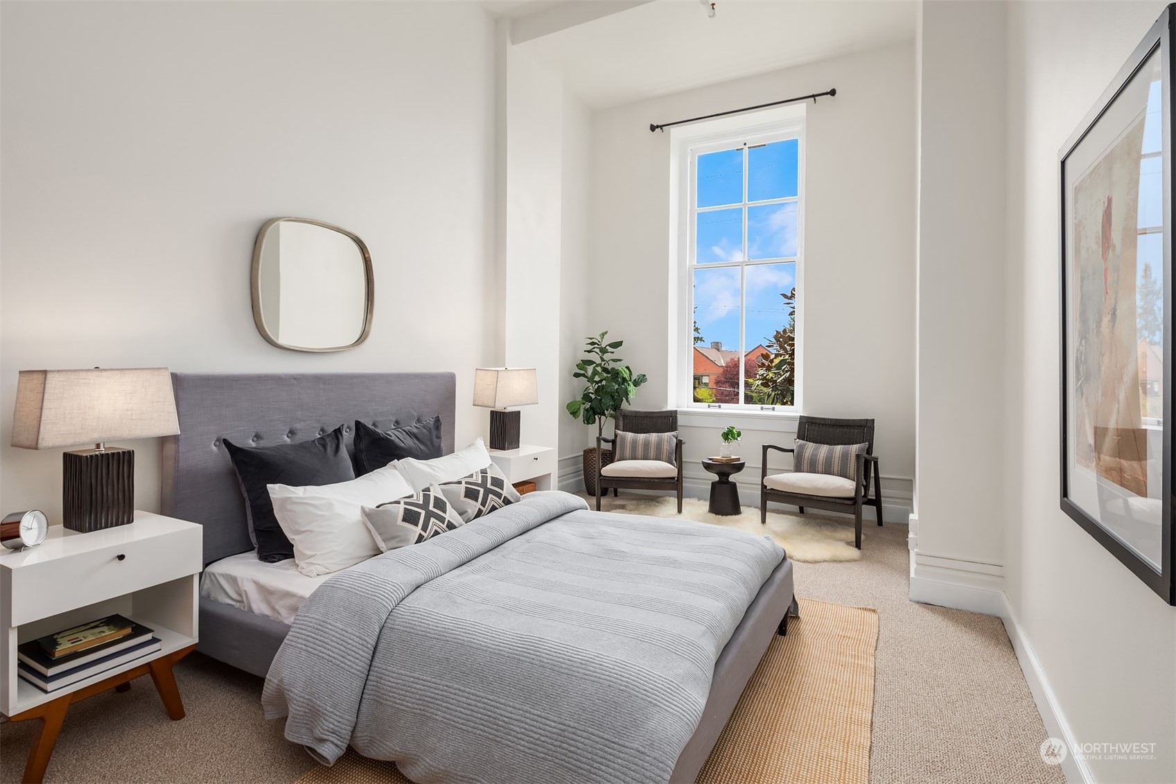 201 Galer Street, Unit 412 Seattle, WA 98109 - Photo 24 of 34 a bedroom with bed and a window