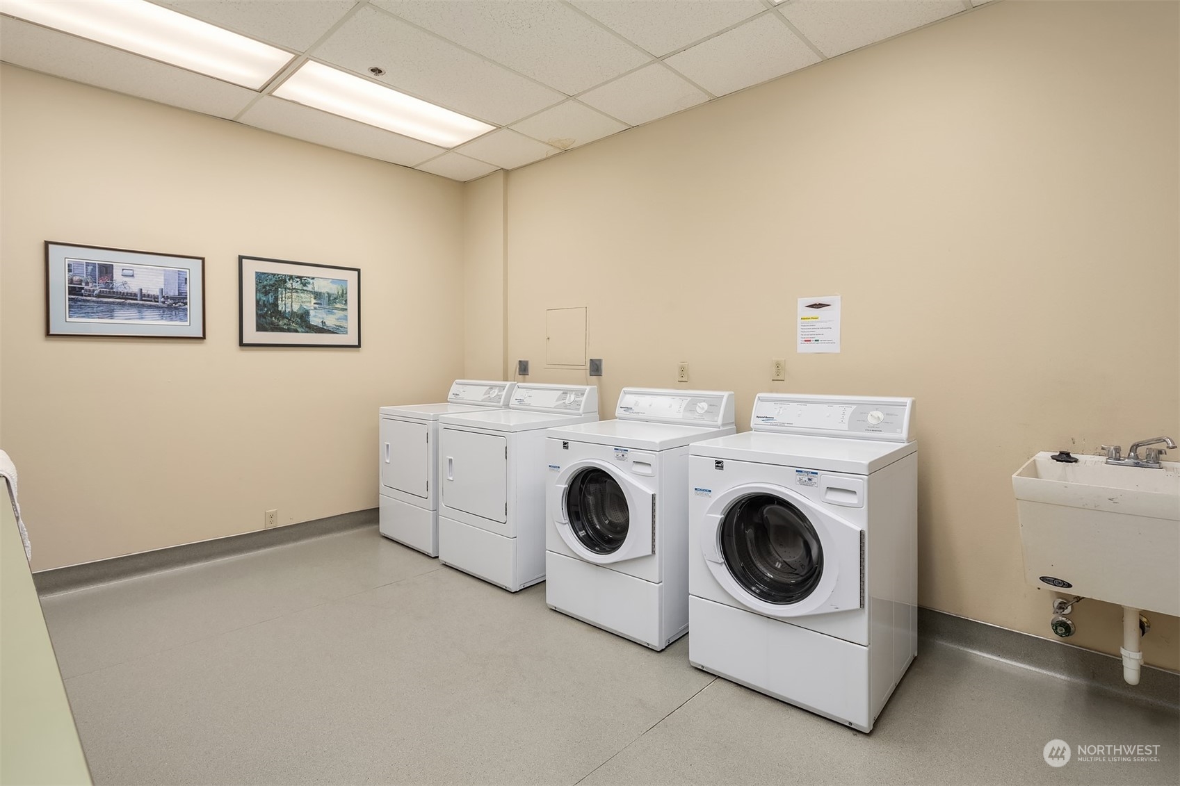 201 Galer Street, Unit 412 Seattle, WA 98109 - Photo 27 of 34 a utility room with dryer and washer