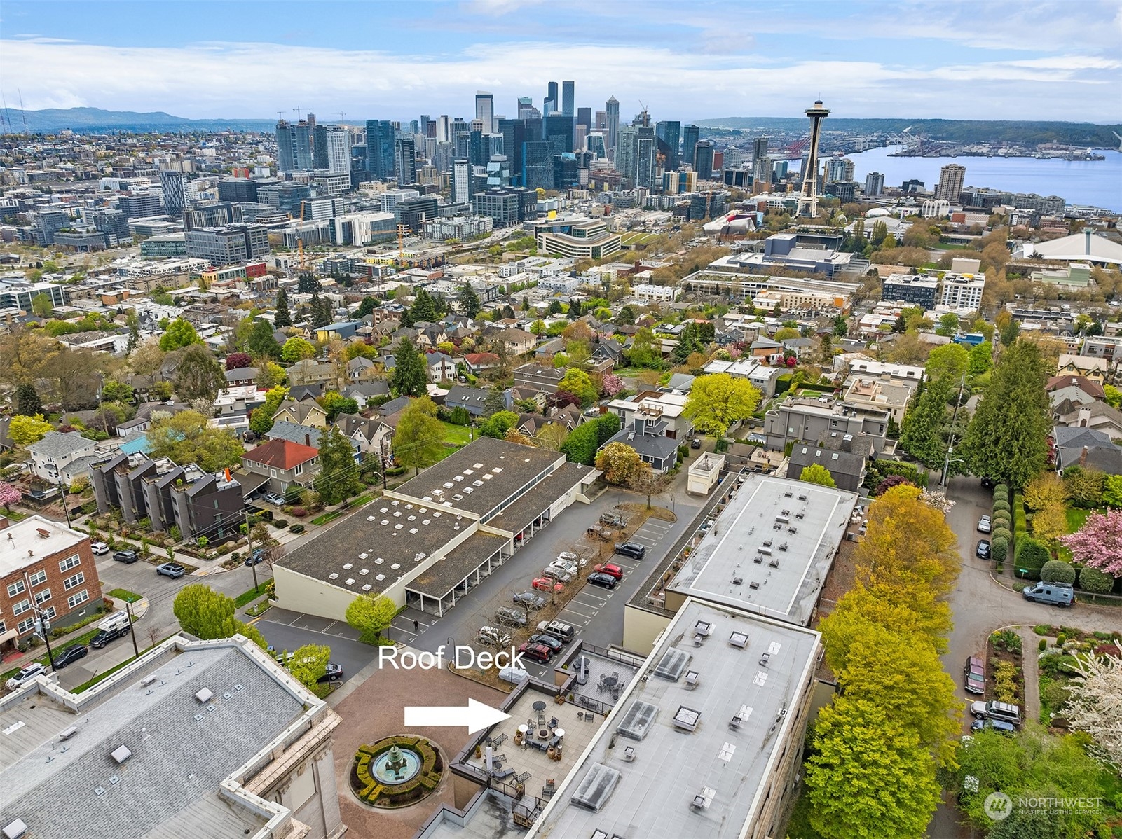 201 Galer Street, Unit 412 Seattle, WA 98109 - Photo 4 of 34 an aerial view of residential building and parking space