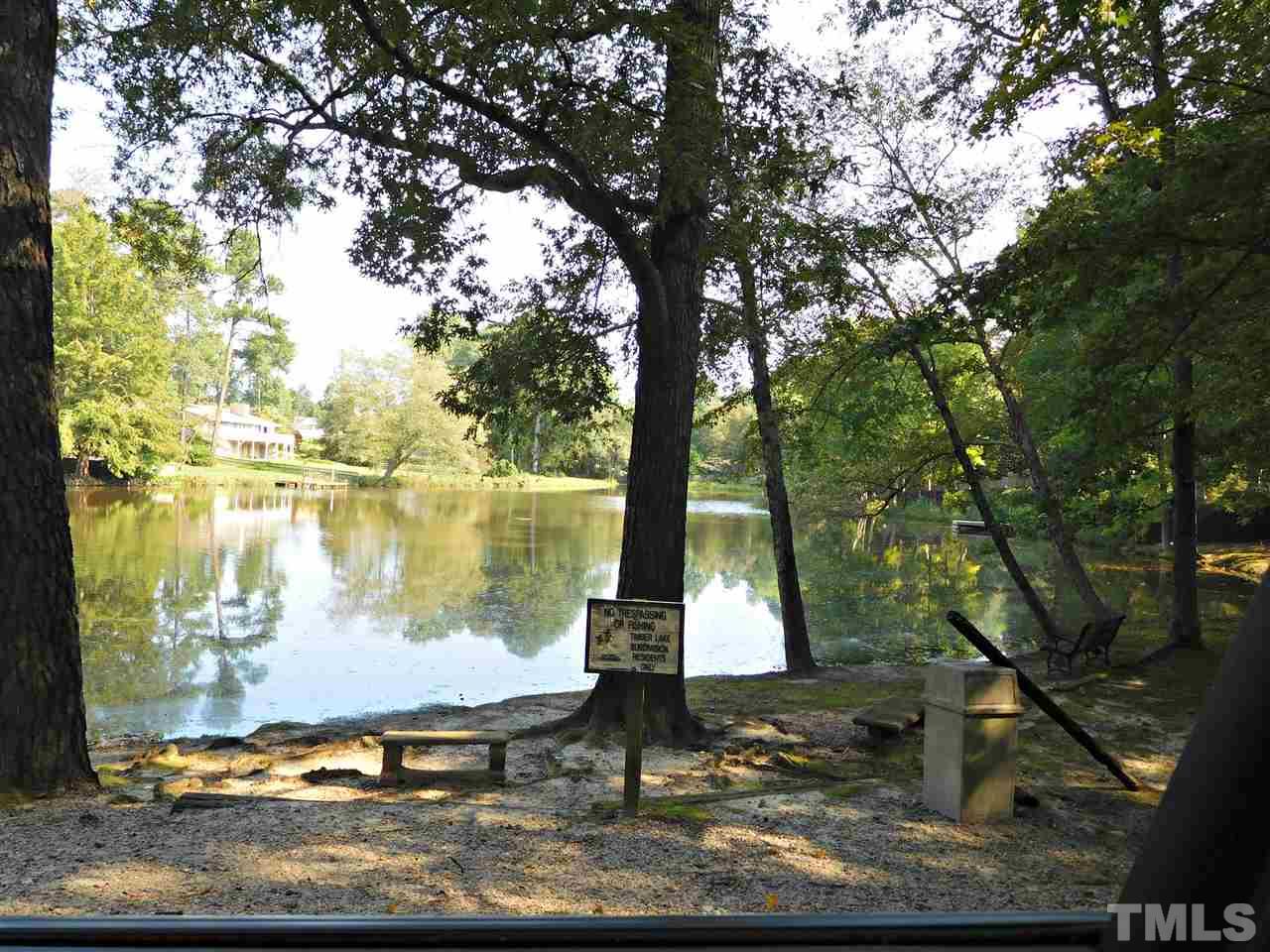 2217 Timberlake Drive Raleigh, NC 27604 - Photo 22 of 22 a view of a lake with a trees