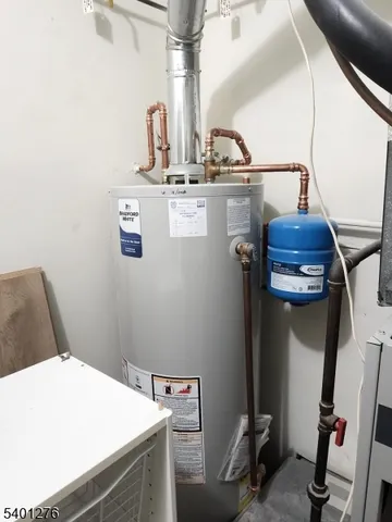 a room with a sink and cabinets