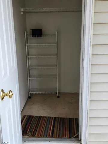 a view of a hardwood & staircase