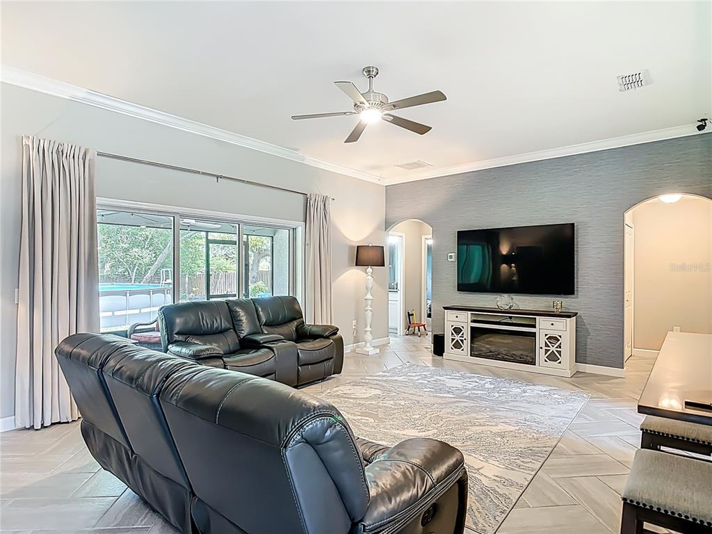 108 Palmira Road DeBary, FL 32713 - Photo 12 of 29 a living room with furniture and a flat screen tv