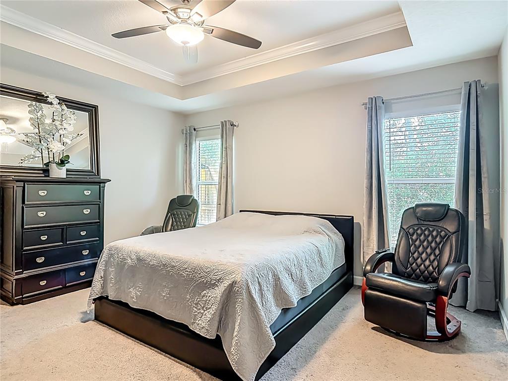 108 Palmira Road DeBary, FL 32713 - Photo 14 of 29 a bedroom with a bed and furniture