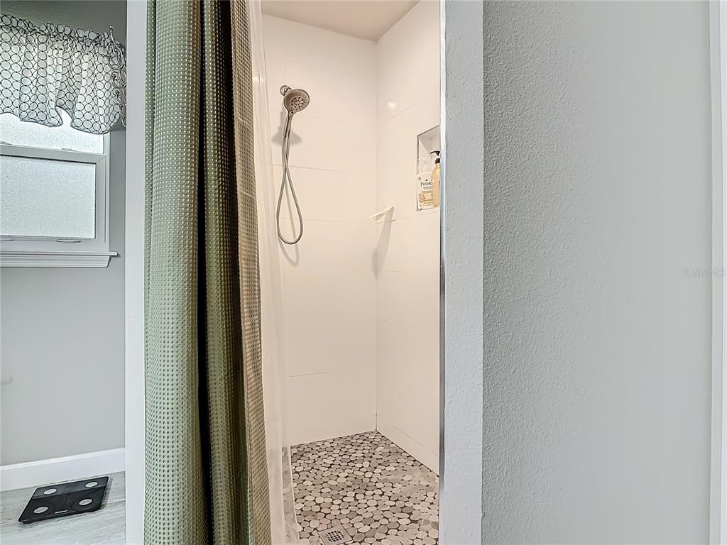108 Palmira Road DeBary, FL 32713 - Photo 17 of 29 a bathroom with a shower