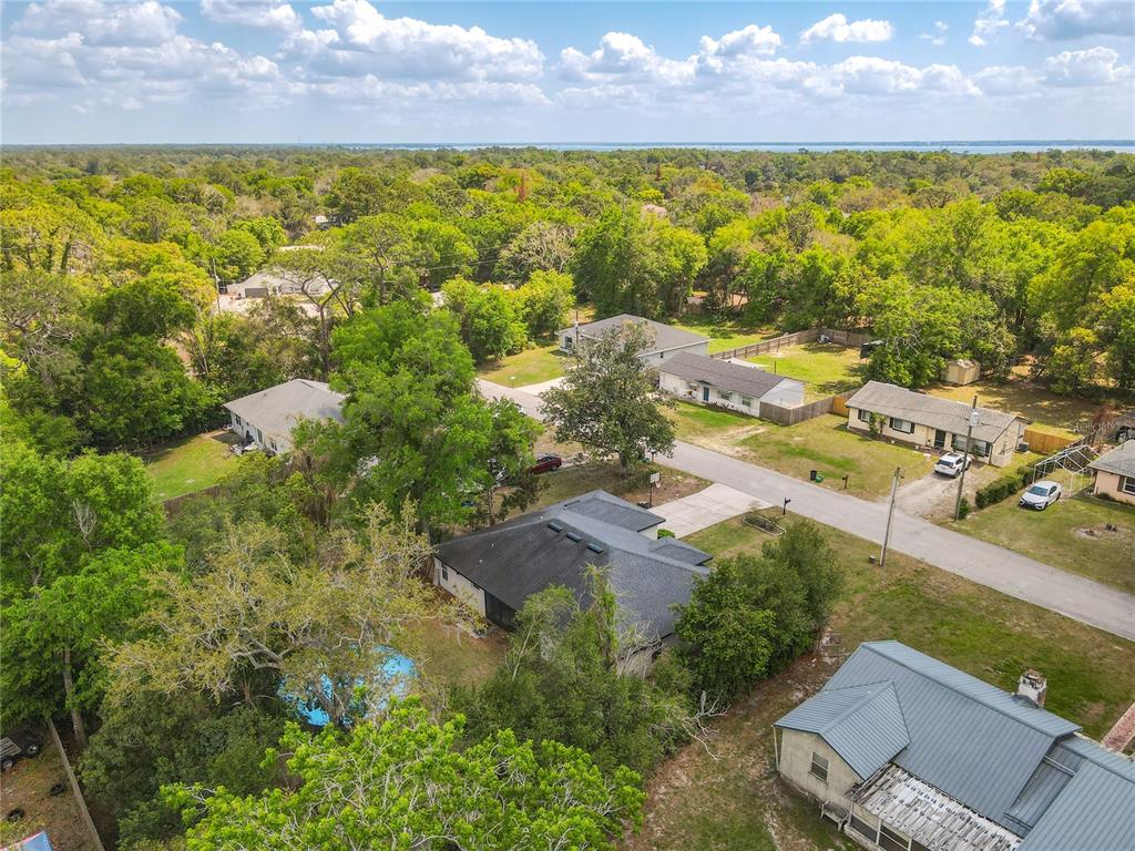 108 Palmira Road DeBary, FL 32713 - Photo 25 of 29 an aerial view of residential houses with outdoor space and trees