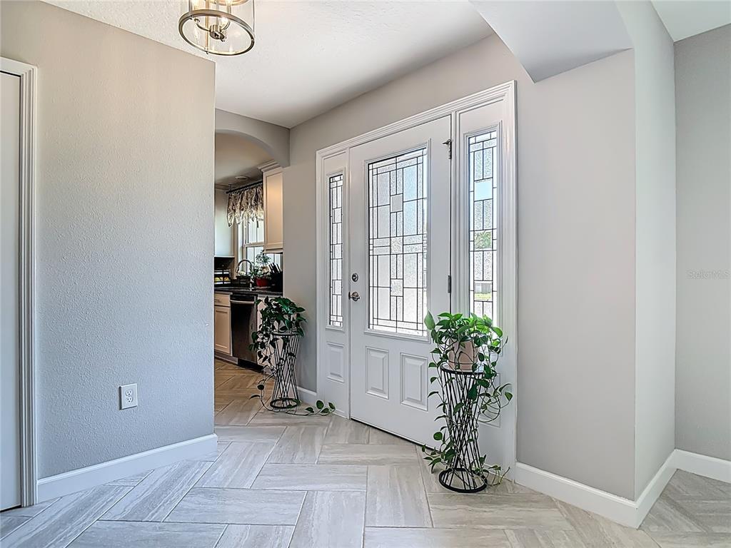 108 Palmira Road DeBary, FL 32713 - Photo 5 of 29 a view of an entryway with wooden floor