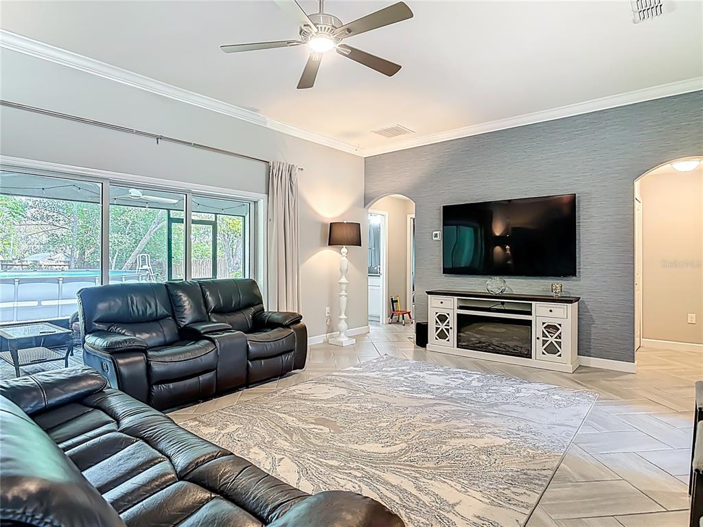 108 Palmira Road DeBary, FL 32713 - Photo 9 of 29 a living room with furniture and a flat screen tv