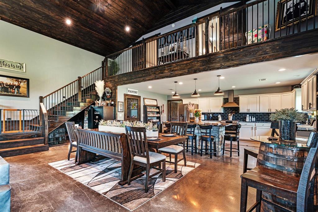 962 County Road Pattonville, TX 75468 - Photo 10 of 37 a view of a dining room with furniture