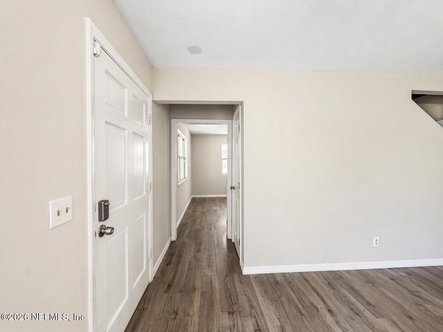 874 West 12th Street St. Augustine, FL 32084 - Photo 13 of 29 a view of a hallway with wooden floor