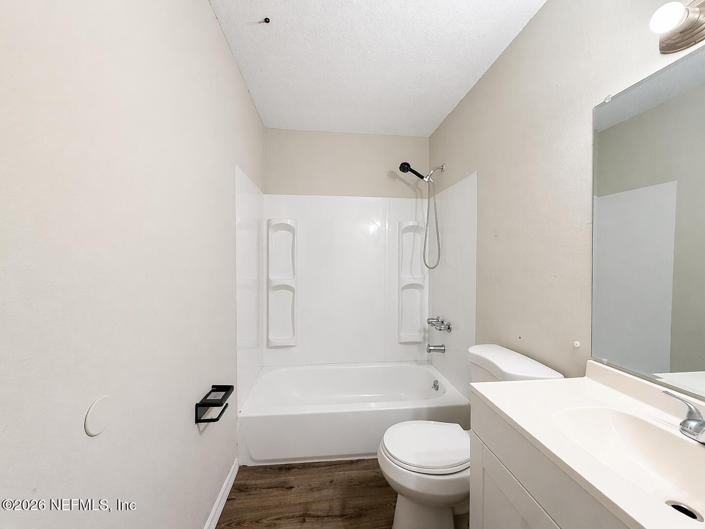 874 West 12th Street St. Augustine, FL 32084 - Photo 24 of 29 a bathroom with a sink a toilet and shower