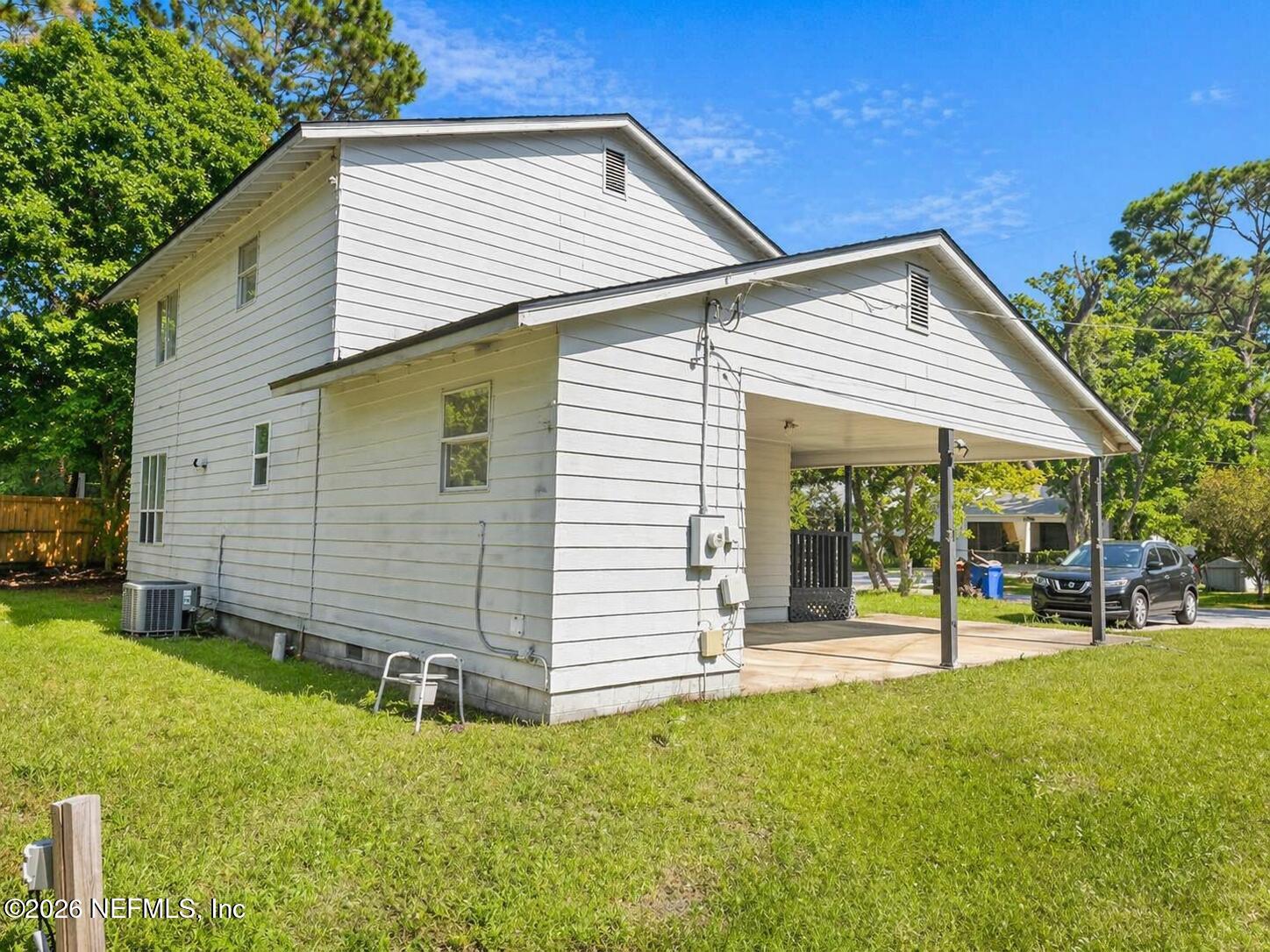 874 West 12th Street St. Augustine, FL 32084 - Photo 5 of 29 a view of a house with backyard