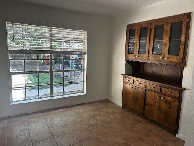 320 County Road 401 Comanche, TX 76442 - Photo 5 of 26 a view of an empty room with a window