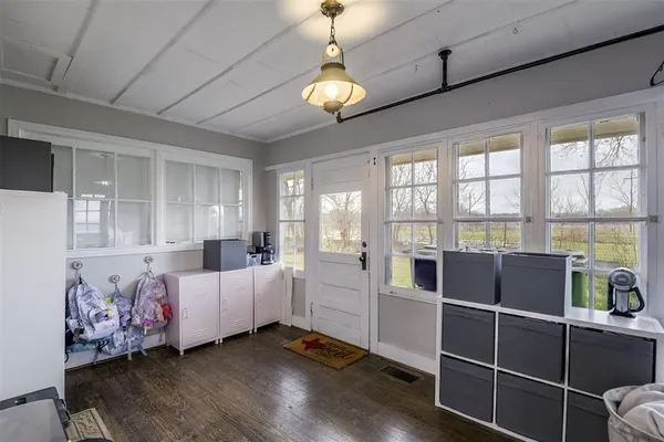 a living room with furniture and window