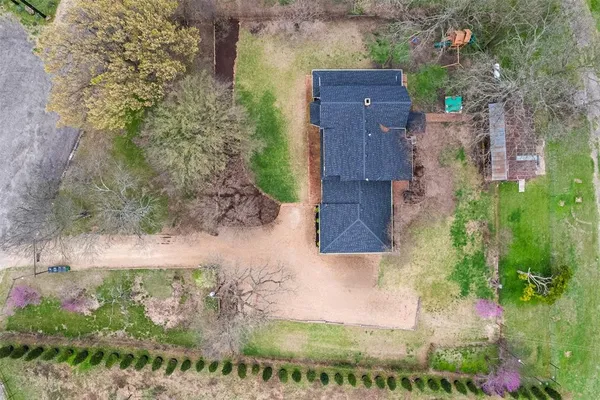 an aerial view of residential house with outdoor space