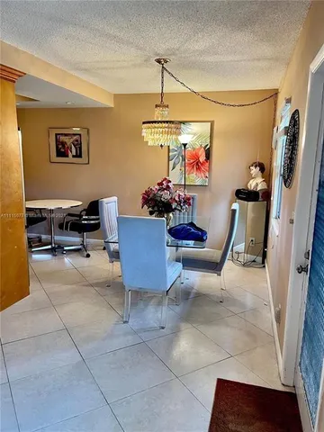 a workspace with furniture and a window