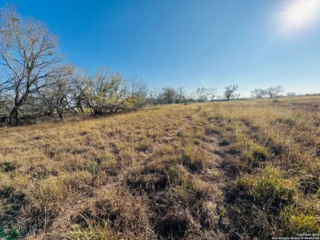 a view of beach and an ocean