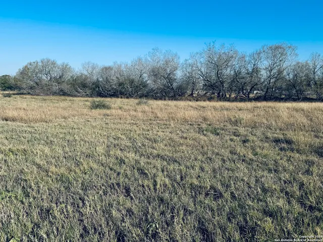 a view of mountain with lake view