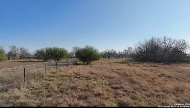 a view of an outdoor space and a yard