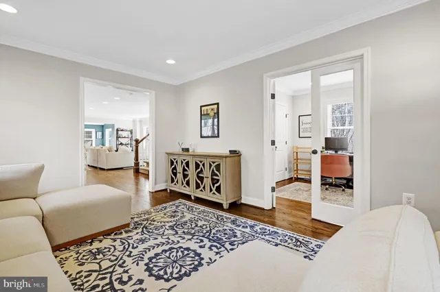a bedroom with furniture and rug