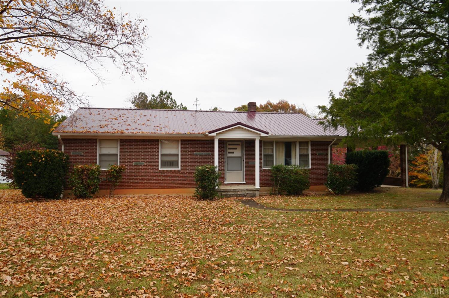 2106 Railview Road Gladys, VA 24554 - Photo 1 of 20 a front view of a house with a garden