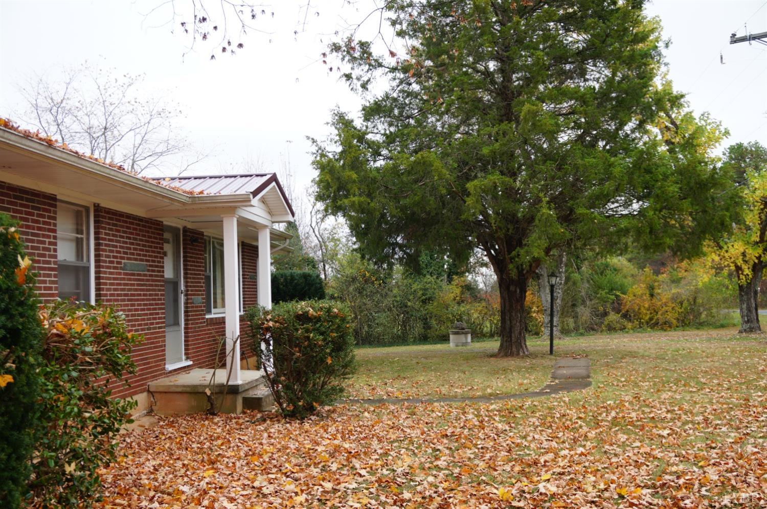 2106 Railview Road Gladys, VA 24554 - Photo 20 of 20 a view of a house with backyard and trees