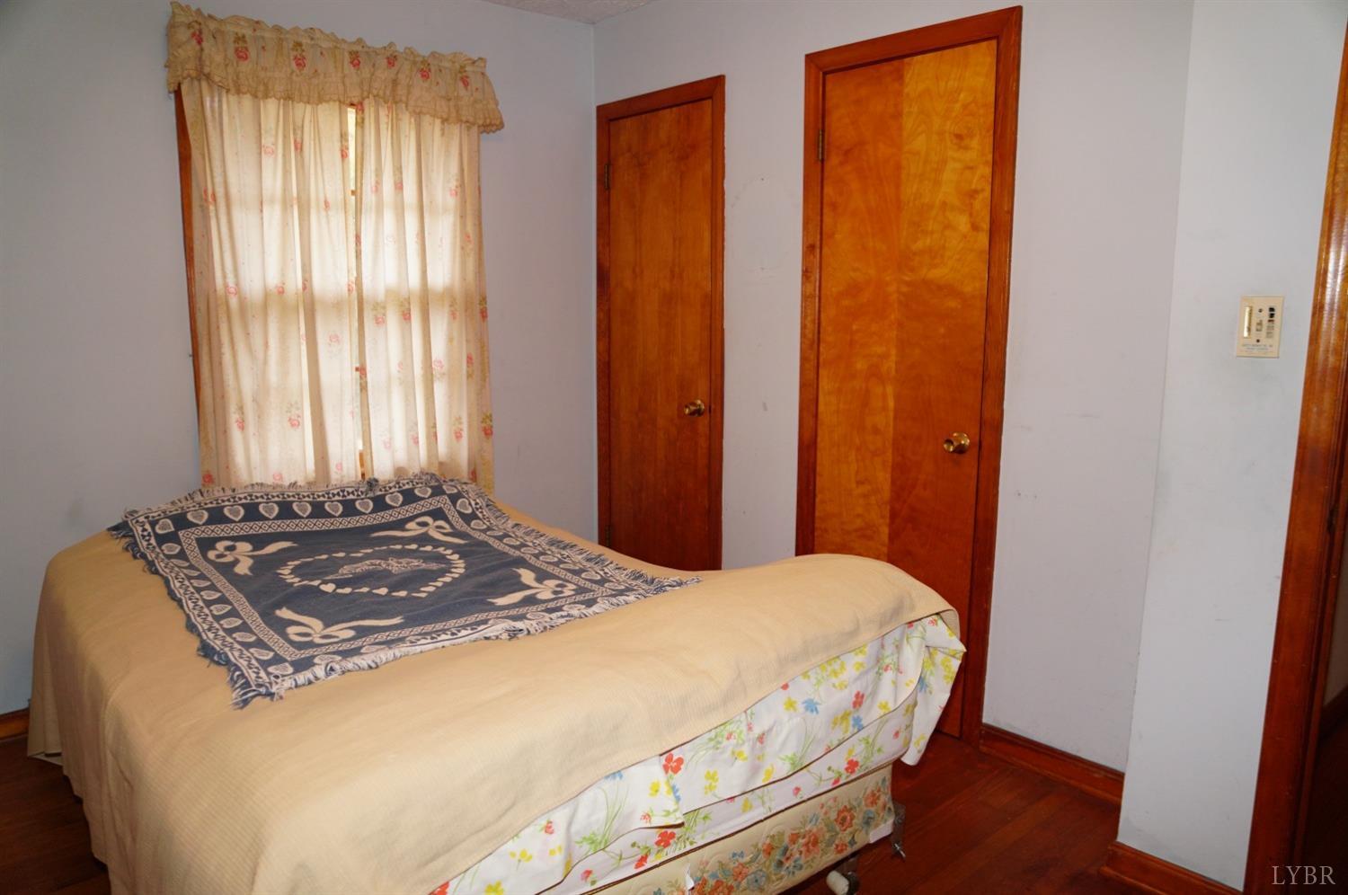 2106 Railview Road Gladys, VA 24554 - Photo 8 of 20 a bedroom with a bed and a window