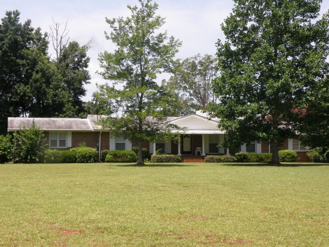 373 Greene Settlement Road Gray, GA 31032 - Photo 1 of 34 a front view of house with yard and green space