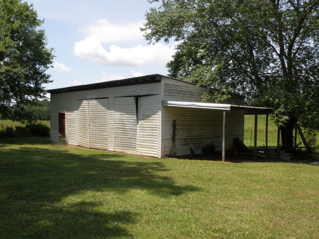 373 Greene Settlement Road Gray, GA 31032 - Photo 15 of 34 a view of a house with a yard