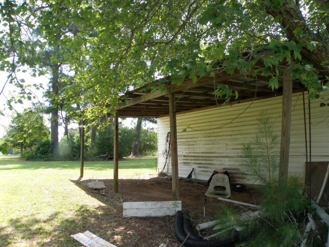 373 Greene Settlement Road Gray, GA 31032 - Photo 17 of 34 a view of a bench in the backyard