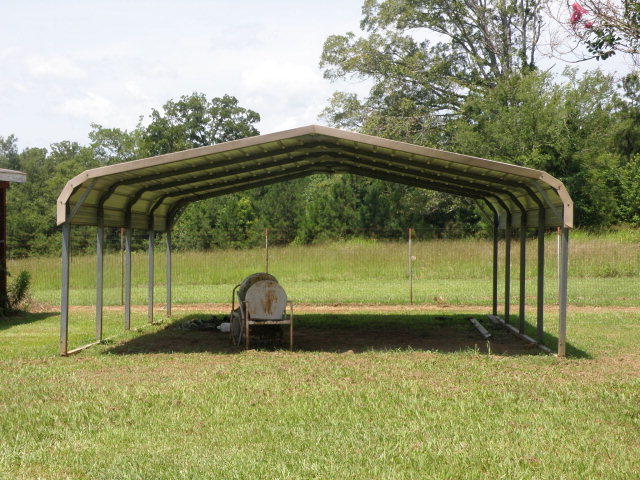 373 Greene Settlement Road Gray, GA 31032 - Photo 18 of 34 a backyard of a house with barbeque oven