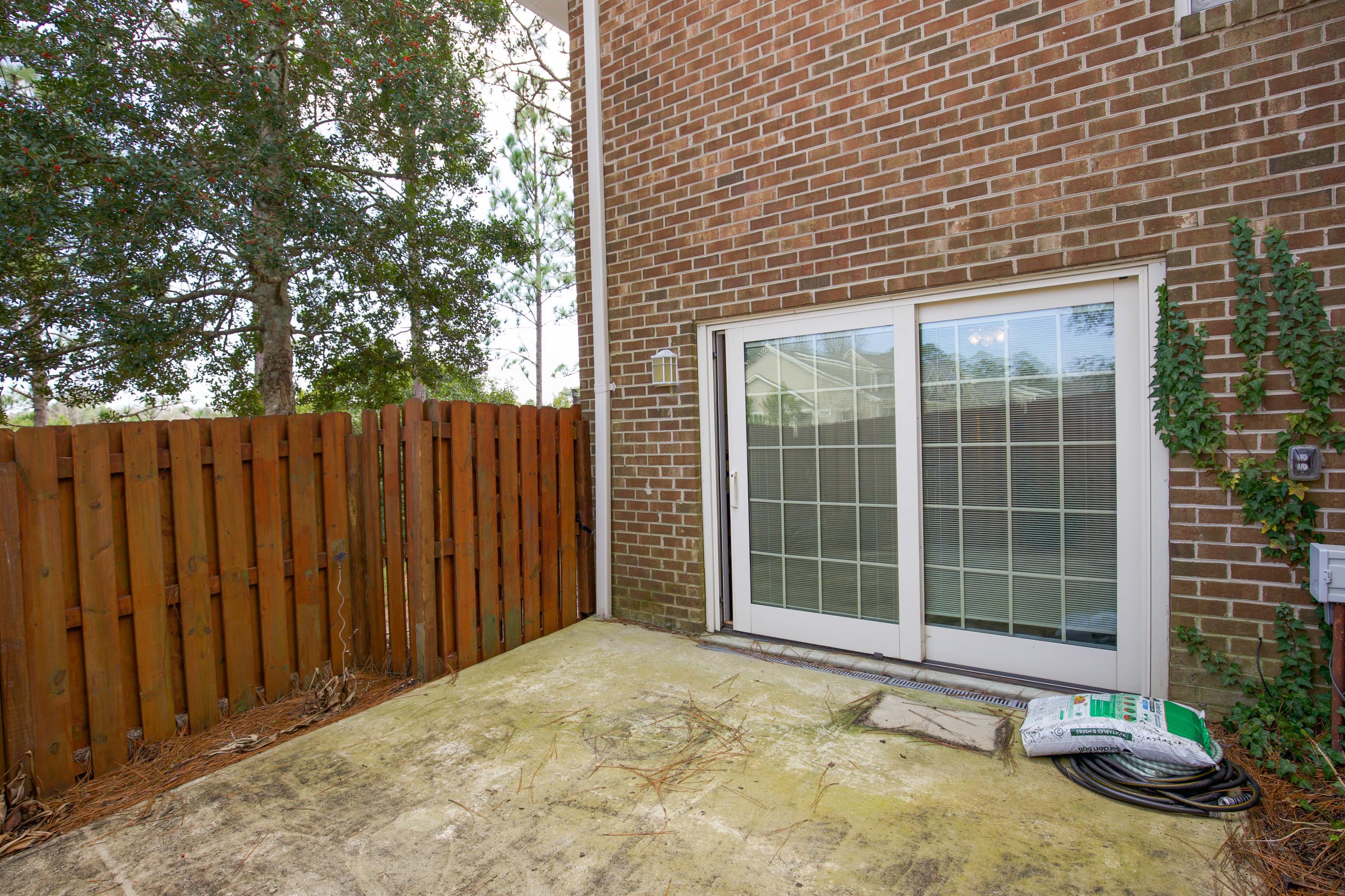 149 Winntown Road Allenhurst, GA 31301 - Photo 42 of 47 Fenced patio off of den