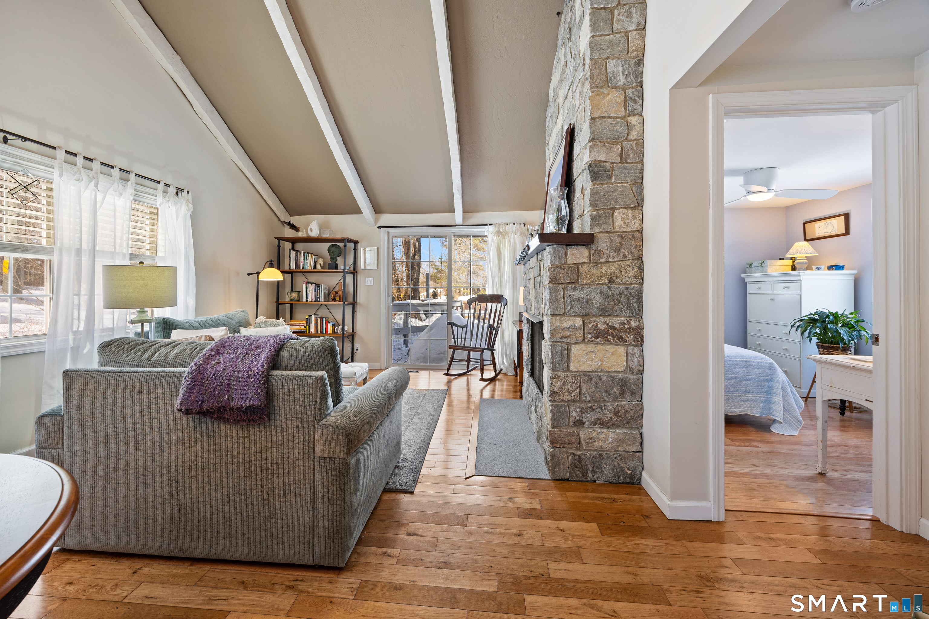 28 Davis Road New Hartford, CT 06057 - Photo 11 of 39 a living room with furniture and a fireplace