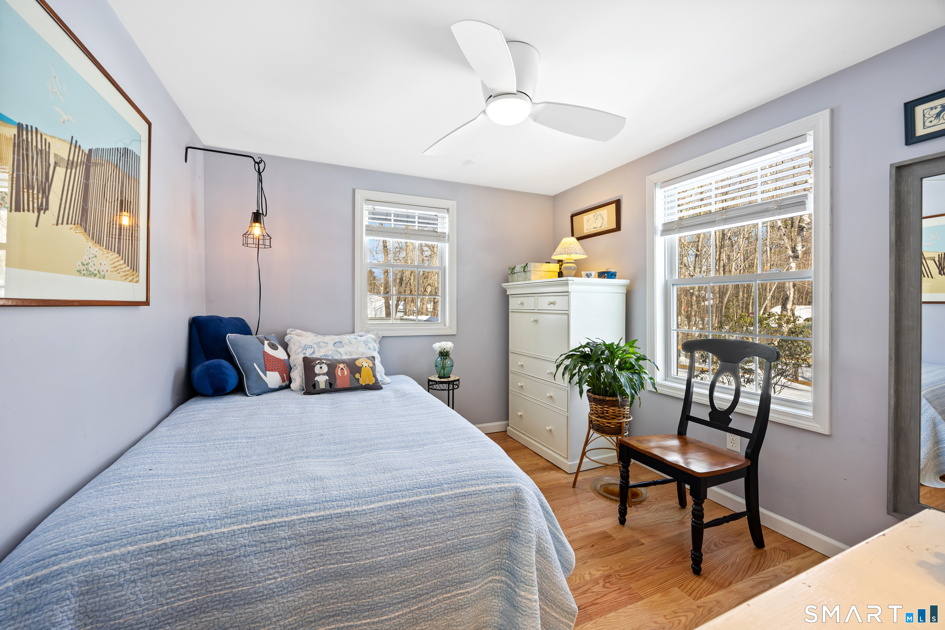 28 Davis Road New Hartford, CT 06057 - Photo 15 of 39 a bedroom with a bed and a large window