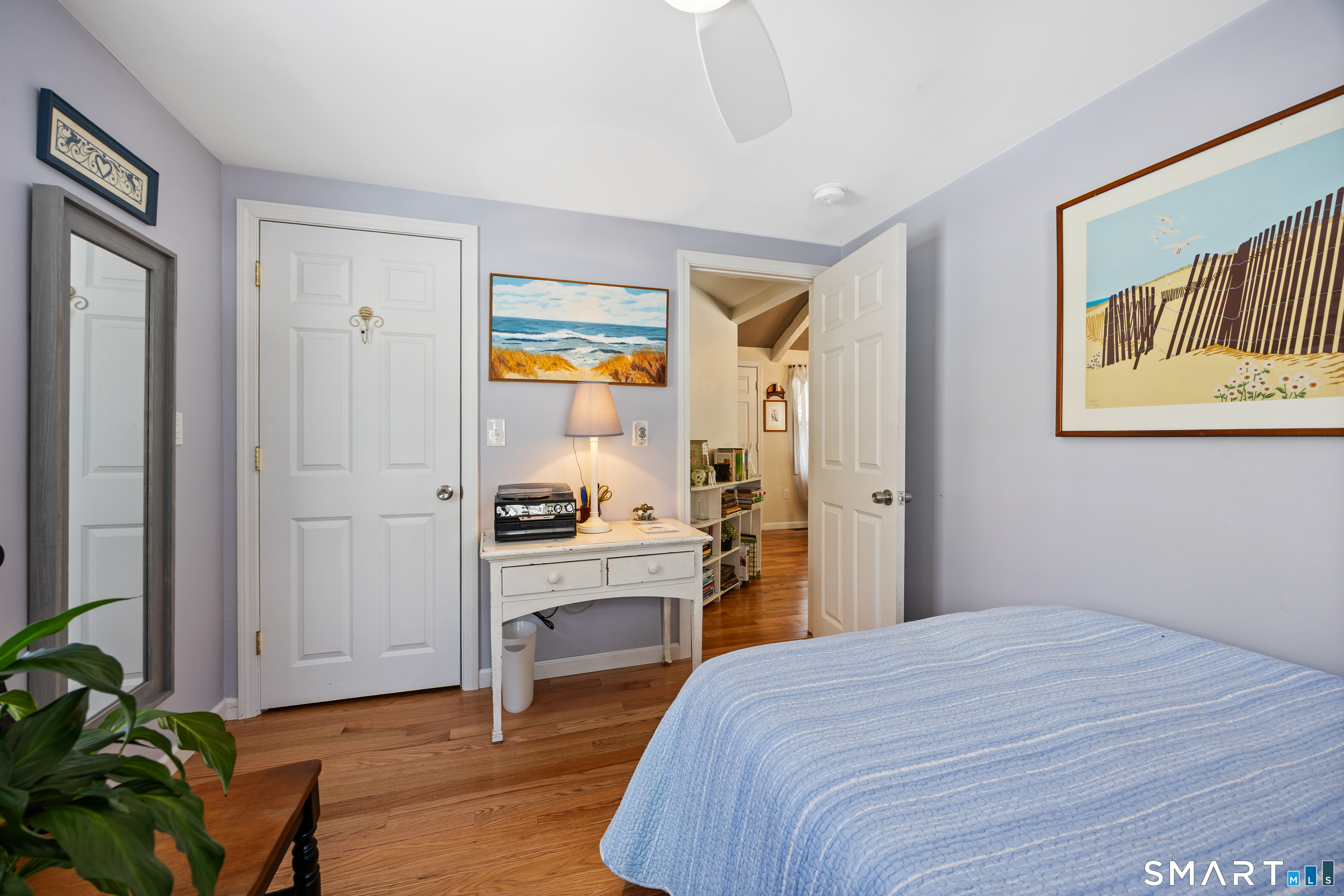 28 Davis Road New Hartford, CT 06057 - Photo 16 of 39 a bedroom with a bed and a table