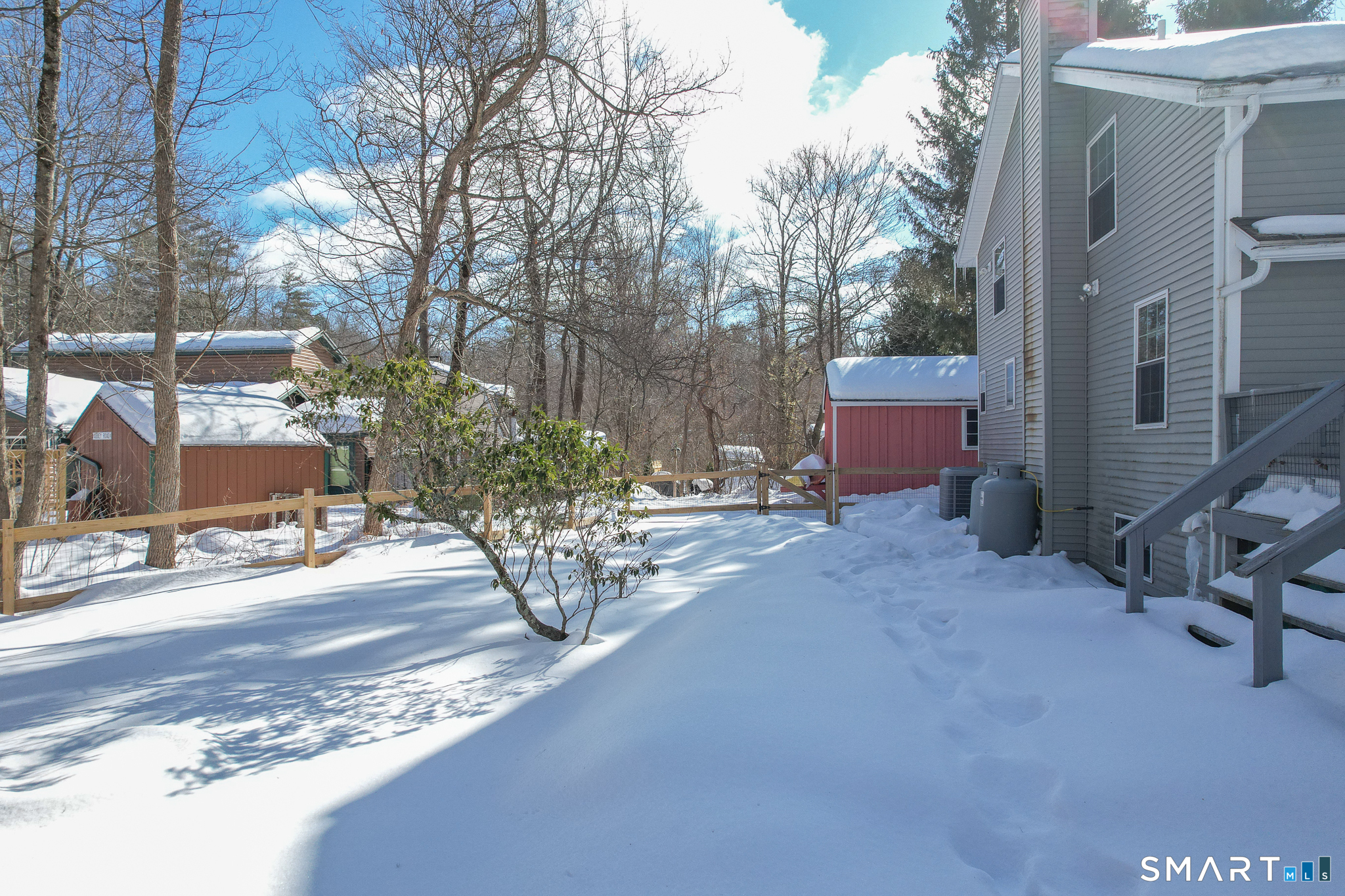 28 Davis Road New Hartford, CT 06057 - Photo 31 of 39 a row of palm trees in front of a building