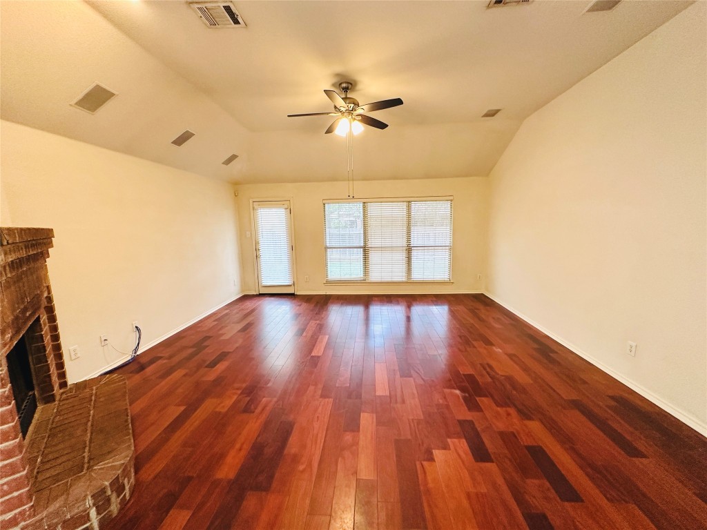 1101 Hunter's Creek Drive Cedar Park, TX 78613 - Photo 12 of 37 a view of empty room with wooden floor and fan