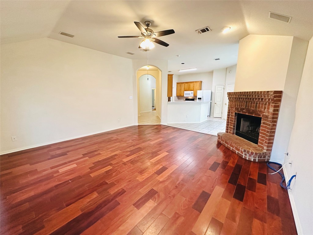 1101 Hunter's Creek Drive Cedar Park, TX 78613 - Photo 15 of 37 a view of livingroom with hardwood floor and a ceiling fan