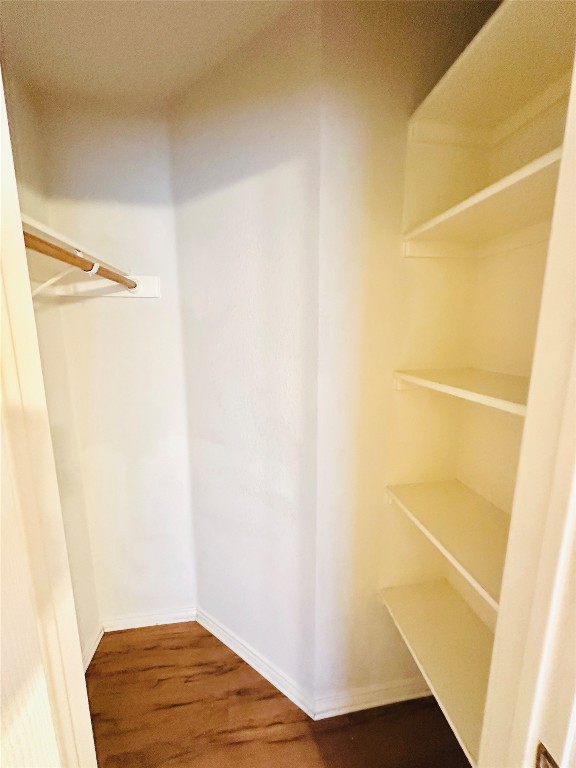 1101 Hunter's Creek Drive Cedar Park, TX 78613 - Photo 26 of 37 a view of walk in closet with wooden floor