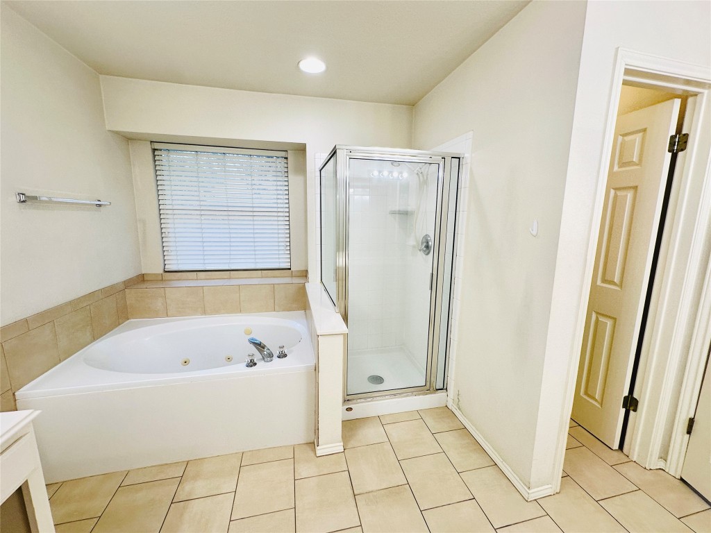 1101 Hunter's Creek Drive Cedar Park, TX 78613 - Photo 37 of 37 a bathroom with a bathtub and a shower