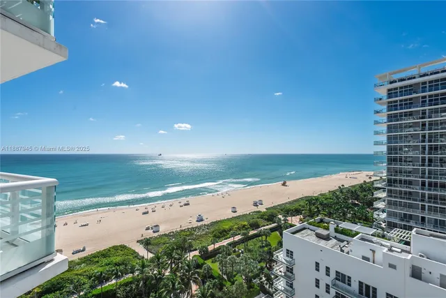 a view of an ocean and city